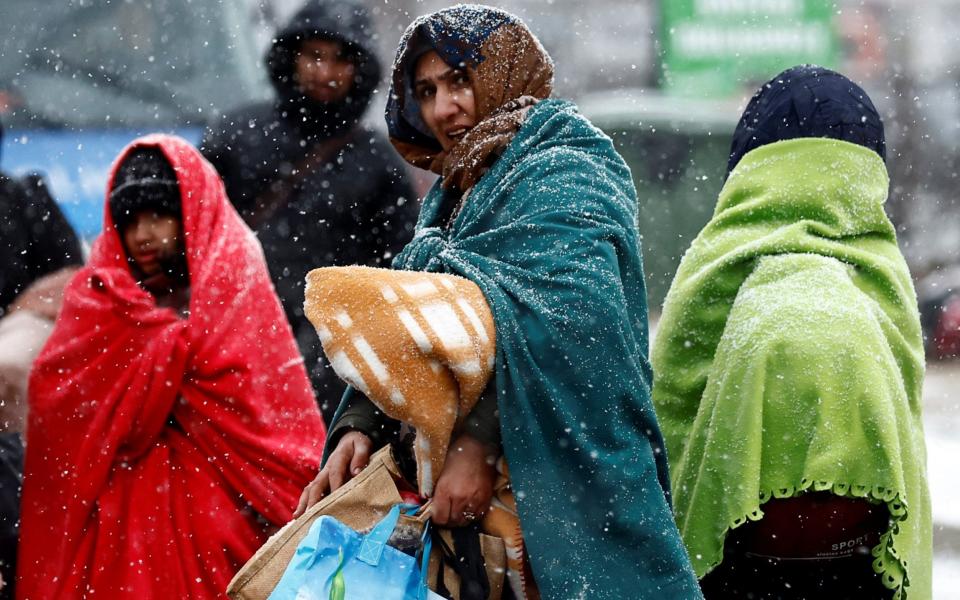 Ukrainians who have fled arriving at a temporary camp in Przemysl, Poland - Yara Nardi/Reuters