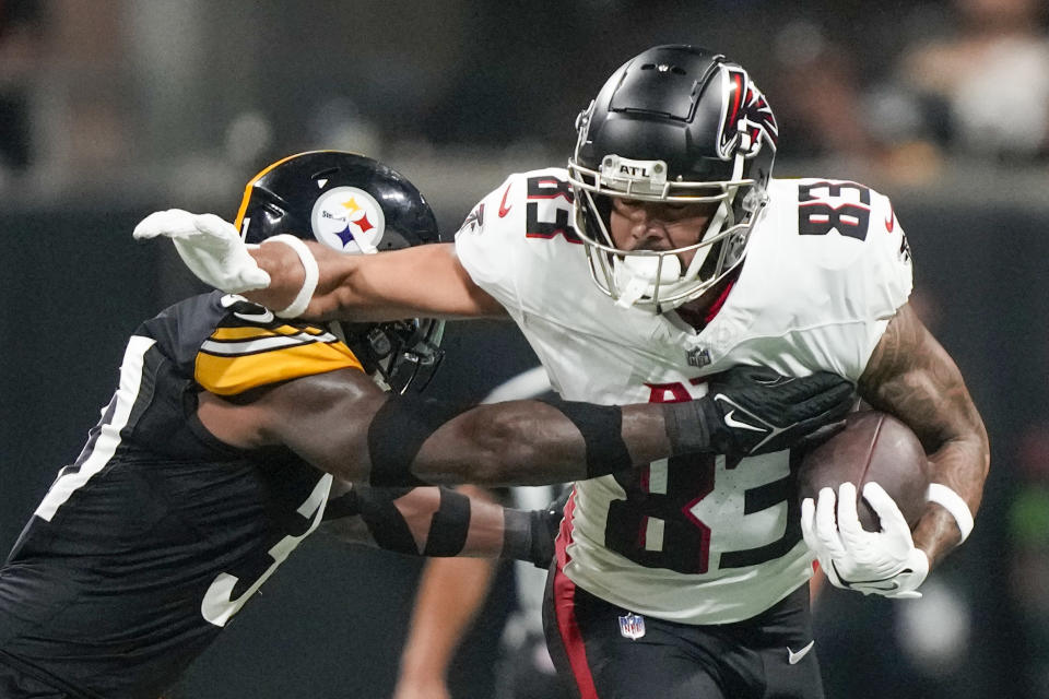 Atlanta Falcons wide receiver J.J. Arcega-Whiteside is tackled by Pittsburgh Steelers safety Keanu Neal during the first half of a preseason NFL football game Thursday, Aug. 24, 2023, in Atlanta. (AP Photo/Gerald Herbert)