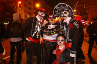 <p>People in Day of the Dead costumes pose for a photo during the 44th annual Village Halloween Parade in New York City on Oct. 31, 2017. (Photo: Gordon Donovan/Yahoo News) </p>