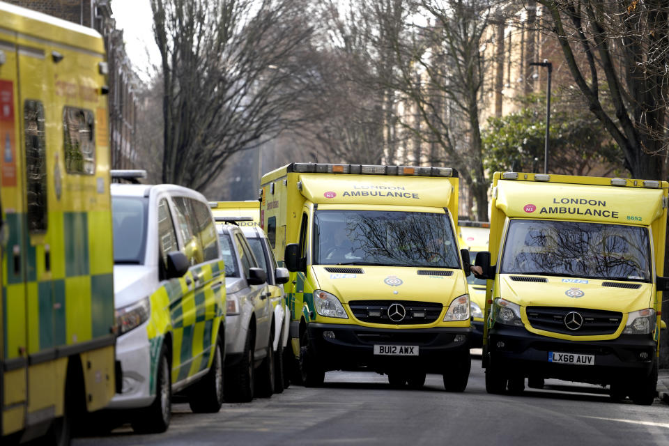 Ambulances are parked on a side street during a strike by members of the Unison union in the long-running dispute over pay and staffing, in London, Friday, Feb. 10, 2023.(AP Photo/Kirsty Wigglesworth)