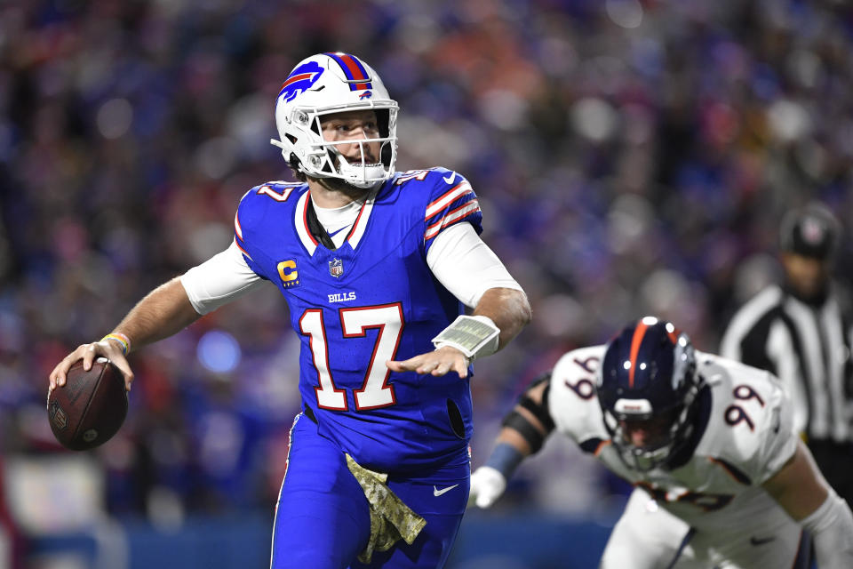 Buffalo Bills quarterback Josh Allen looks to throw during the first half of an NFL football game against the Denver Broncos, Monday, Nov. 13, 2023, in Orchard Park, N.Y. (AP Photo/Adrian Kraus)