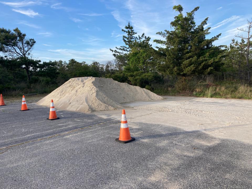 A pile of sand in Gordon's Pond parking lot at Cape Henlopen State Park is evidence of the work going into repairing the beaches after the May 2022 storm.