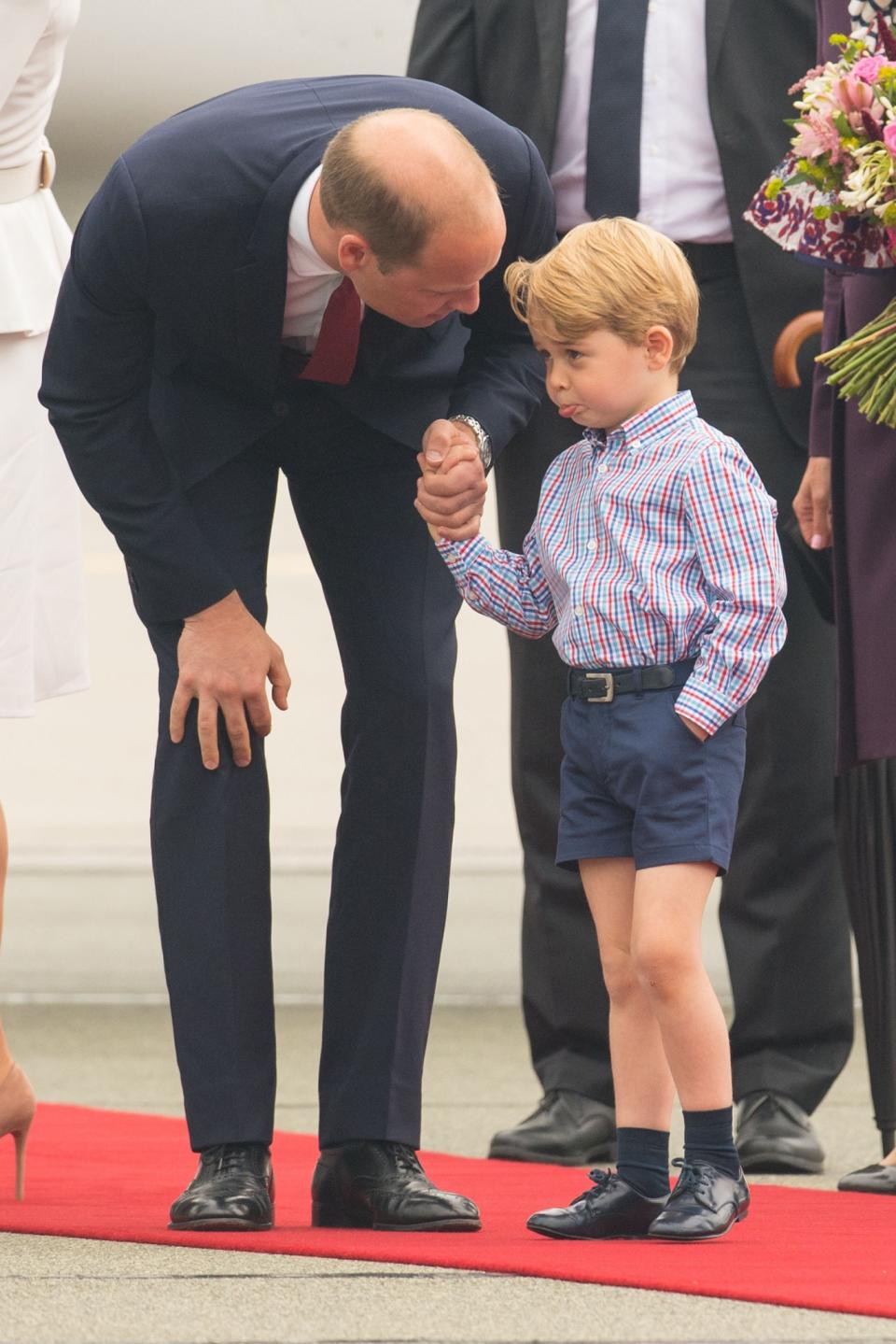 <p>The four-year-old received a telling off from his father in the same pair of navy shorts paired with another smart shirt. [Photo: PA] </p>
