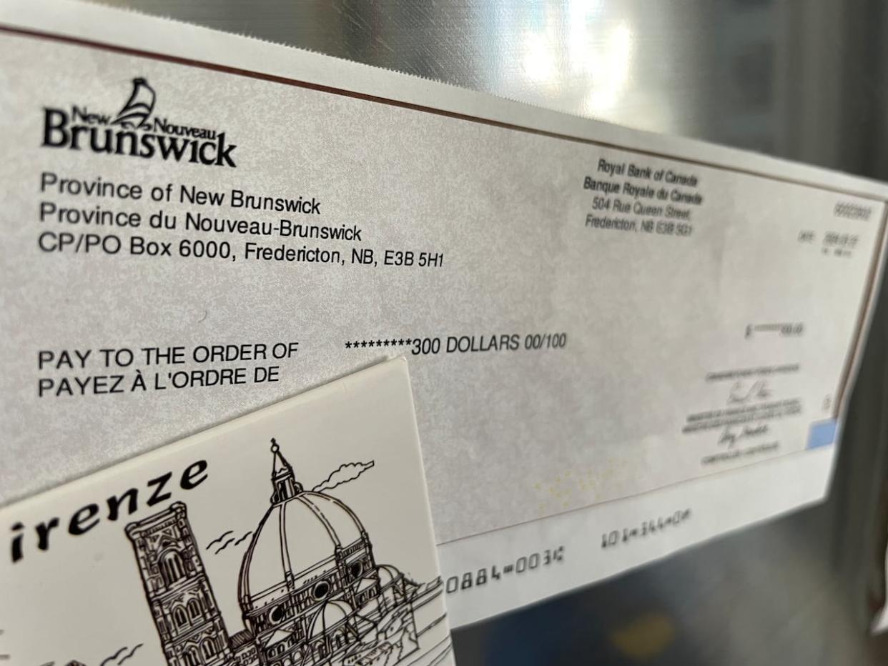 New Brunswick's Department of Finance estimated 196,000 workers' benefit cheques for $300 would be issued to eligible recipients by March 31. Figures show the initiative came up 146,000 short. (Robert Jones/CBC - image credit)