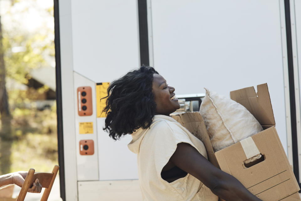 woman with moving boxes