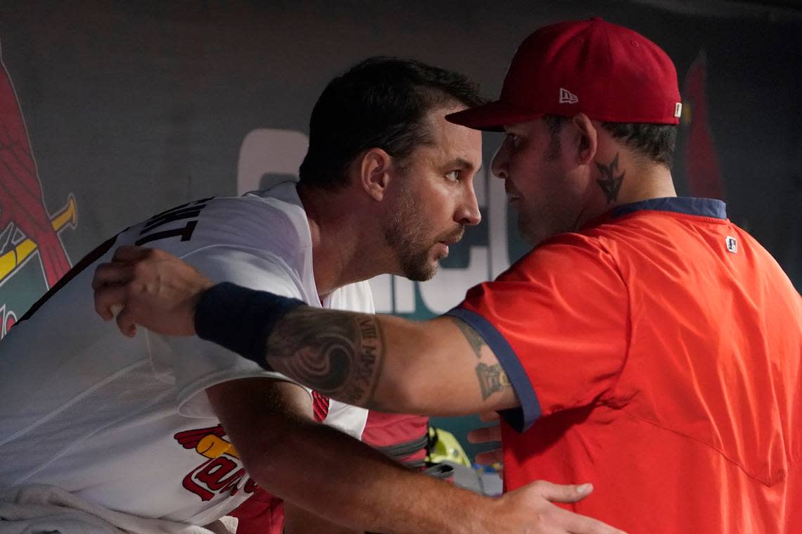 St. Louis Cardinals starting pitcher Adam Wainwright, left, gets a hug from teammate Yadier Molina after working against the Milwaukee Brewers last season. Molina seems to be a near-lock to make the Major League Baseball Hall of Fame once his playing days are over. But what about Wainwright? BND readers have a chance to cast their vote in the latest poll.
