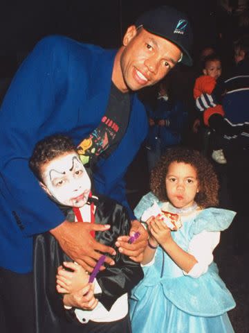 <p>Robin Platzer/Getty</p> Doc Rivers and his kids Jeremiah Rivers and Callie Rivers at the Halloween on the Green AIDS benefit hosted by Magic Johnson.