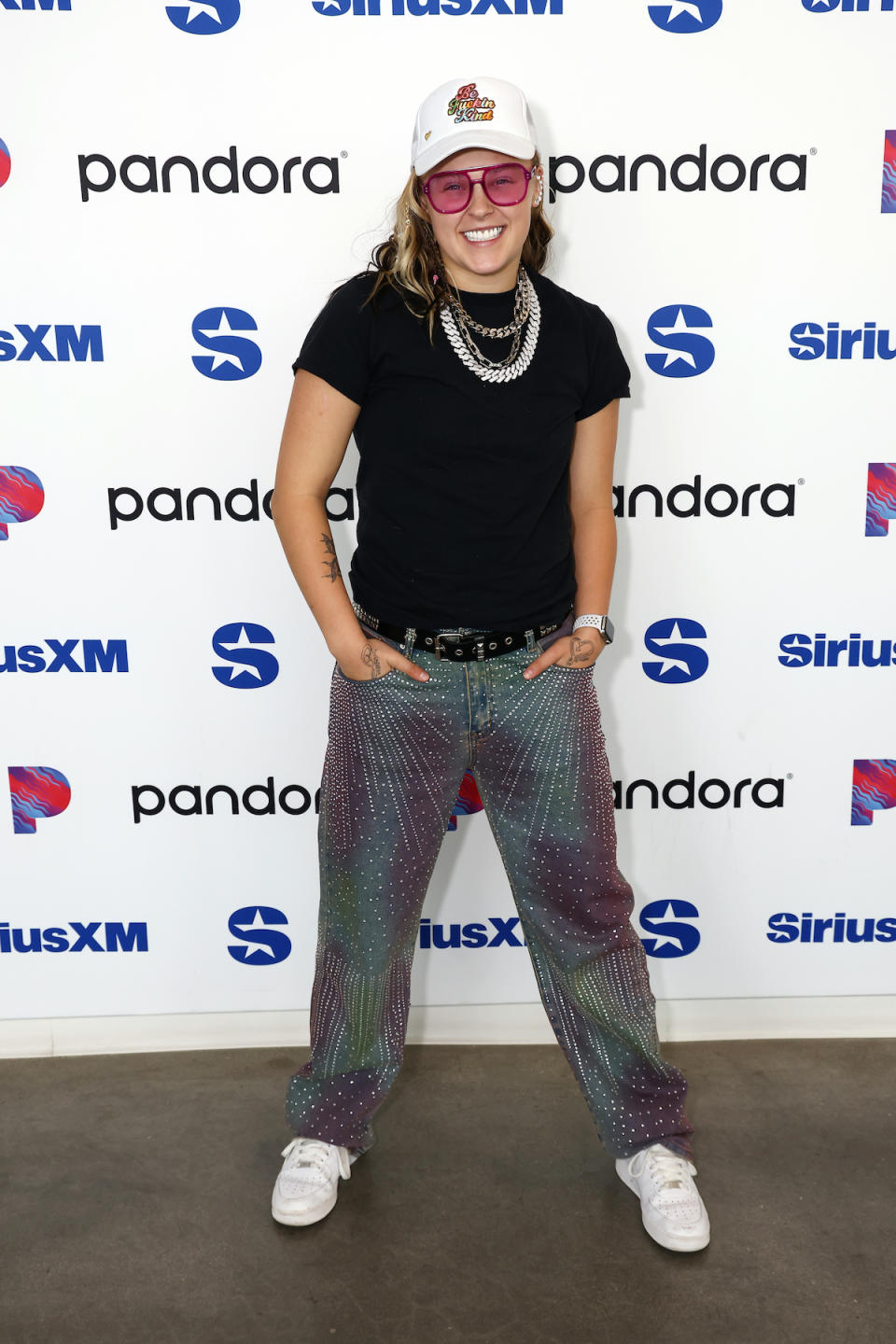 JoJo Siwa visits SiriusXM Studios on May 29, 2024 in Los Angeles, California in Nike shoes.