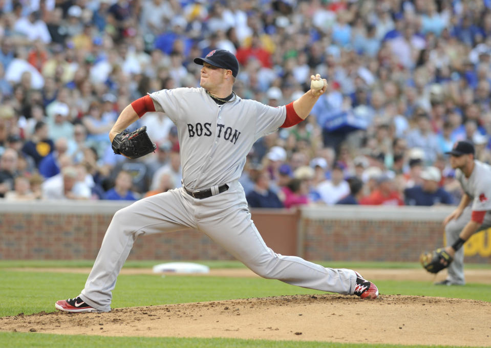 CHICAGO, IL - JUNE 16: Jon Lester #31 of the Boston Red Sox pitches against the Chicago Cubs in the first inning on June 16, 2012 at Wrigley Field in Chicago, Illinois. (Photo by David Banks/Getty Images)