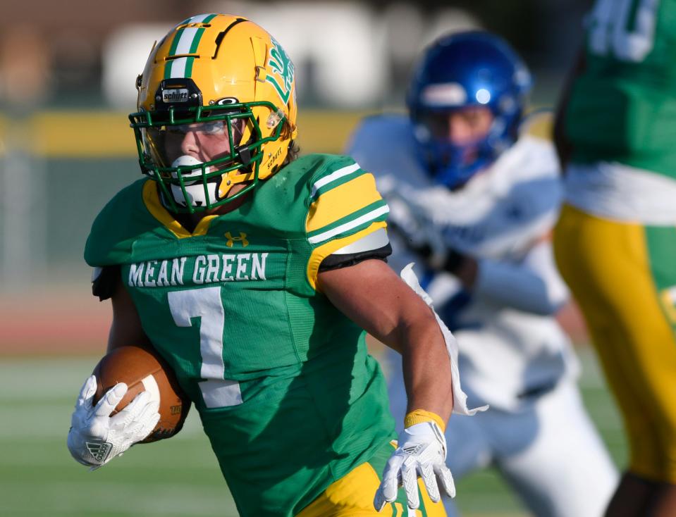 New Deal's Slide Martin runs with the ball against Farwell, Friday, Aug. 26, 2022, at Noland Stadium in New Deal. 