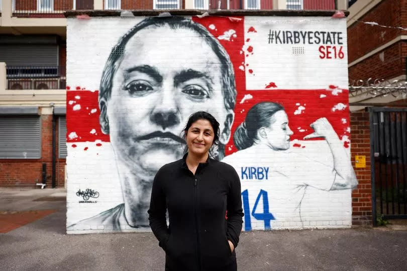 Tugce Yildiril poses for photos in front of mural for Fran Kirby in Kirby estate
