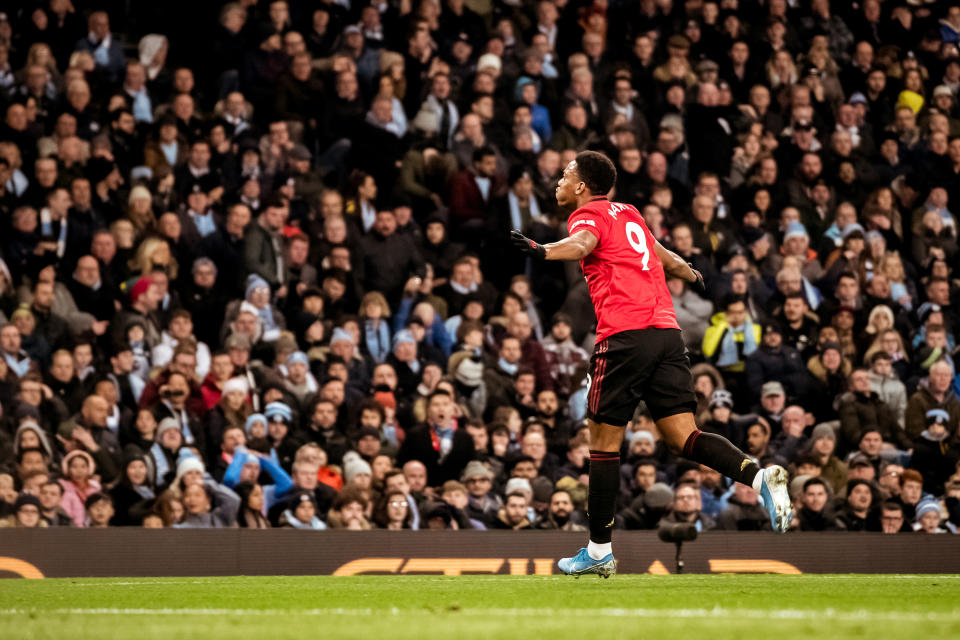 MANCHESTER, ENGLAND - DECEMBER 07: Anthony Martial of Manchester United celebrates scoring their second goal during the Premier League match between Manchester City and Manchester United at Etihad Stadium on December 07, 2019 in Manchester, United Kingdom. (Photo by Ash Donelon/Manchester United via Getty Images)