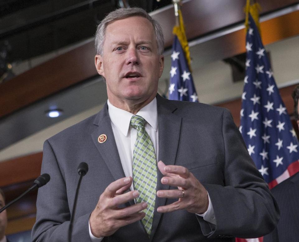 FILE - In this Sept. 19, 2013 file photo, Rep. Mark Meadows, R-N.C, speaks on Capitol Hill in Washington. The 2012 election should ave been a good one for Democrats running for Congress in North Carolina. Together, they received a total of 2.2 million votes_nearly 100,000 more than their Republican opponents. But when the votes were divvied up among the state's 13 House districts, the Democrats came up shot, way short. (AP Photo/J. Scott Applewhite, File)