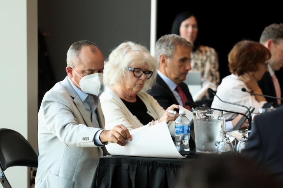 Moncton Coun. Shawn Crossman, left, during the Sept. 16, 2024, city council meeting at the Avenir Centre. 