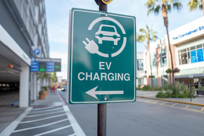Close-up of sign for electric vehicle charging station on Santana Row in the Silicon Valley, San Jose, California, January 3, 2020. (Smith Collection/Gado/Getty Images)