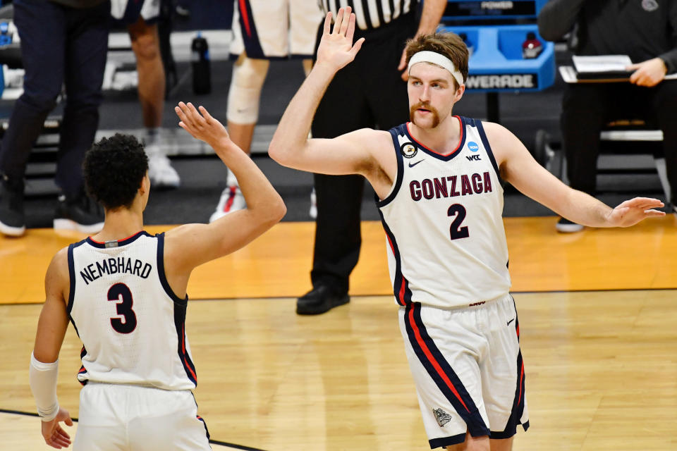 Mar 22, 2021; Indianapolis, Indiana, USA; Gonzaga Bulldogs forward Drew Timme (2) and guard Andrew Nembhard (3) react after a play against the Oklahoma Sooners during the second half in the second round of the 2021 NCAA Tournament at Hinkle Fieldhouse. The Gonzaga Bulldogs won 87-71. Mandatory Credit: Patrick Gorski-USA TODAY Sports