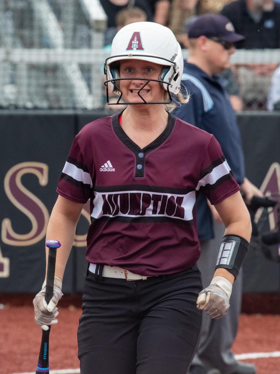 Assumption's Izzy Rushing reacts after scoring a run Tuesday night against Mercy Academy. Assumption won the game 10-0 after an early offensive explosion. April 12, 2022