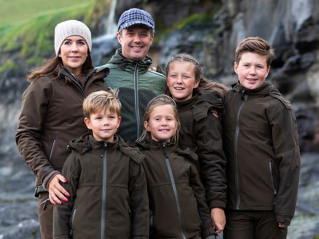 <p>Ole Jensen/Corbis/Getty</p> Danish Crown Prince and his family during their visit to the village of Mikladalur on August 24, 2018.