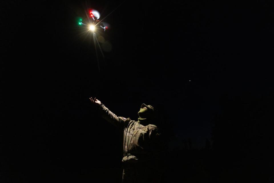 Ukrainian military practice flying drones at night using thermal vision on May 11, 2023, in Lviv Oblast. The school is funded by KOLO, a Ukrainian foundation running a pilot school of drones and UAVs for the military. (Paula Bronstein /Getty Images)