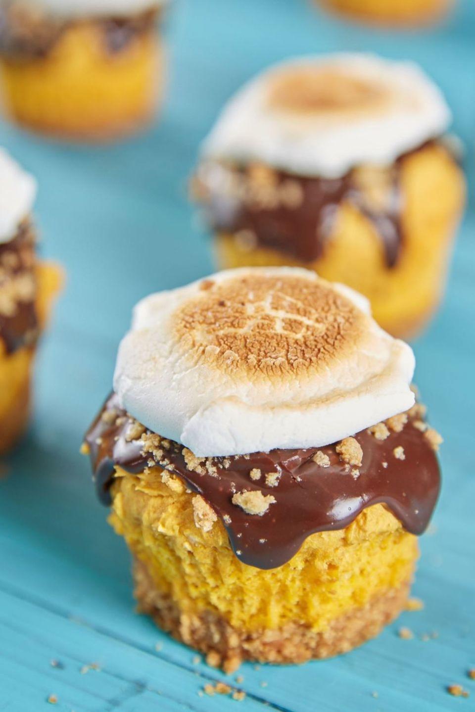 <p>Use vanilla cake mix and canned pumpkin to create this oh so easy marshmallow and pumpkin cupcake in under an hour!</p><p>Get the <strong><a href="https://www.delish.com/cooking/recipe-ideas/recipes/a49181/smores-pumpkin-cupcakes-recipe/" rel="nofollow noopener" target="_blank" data-ylk="slk:S'mores Pumpkin Cupcakes recipe;elm:context_link;itc:0;sec:content-canvas" class="link ">S'mores Pumpkin Cupcakes recipe</a></strong> from Delish. </p><p><strong>RELATED:</strong> <a href="https://www.goodhousekeeping.com/food-recipes/dessert/g28089407/easy-fall-desserts/" rel="nofollow noopener" target="_blank" data-ylk="slk:79 Easy Fall Desserts That'll Wow Your Dinner Guests;elm:context_link;itc:0;sec:content-canvas" class="link ">79 Easy Fall Desserts That'll Wow Your Dinner Guests</a></p>