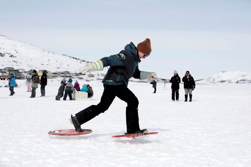 The Wider Image: Climate change means the Inuit do what they've always done: Adapt