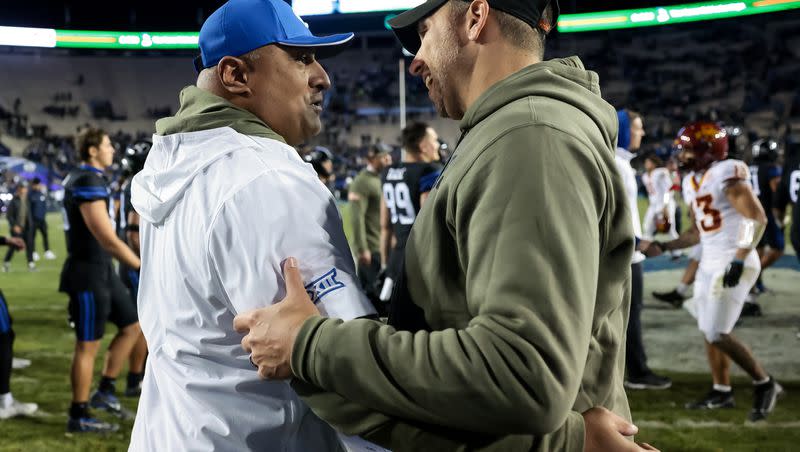 BYU Cougars head coach Kalani Sitake and Iowa State Cyclones head coach Matt Campbell talk after the Cyclines beat the Cougars 45-13 at LaVell Edwards Stadium in Provo on Saturday, Nov. 11, 2023.