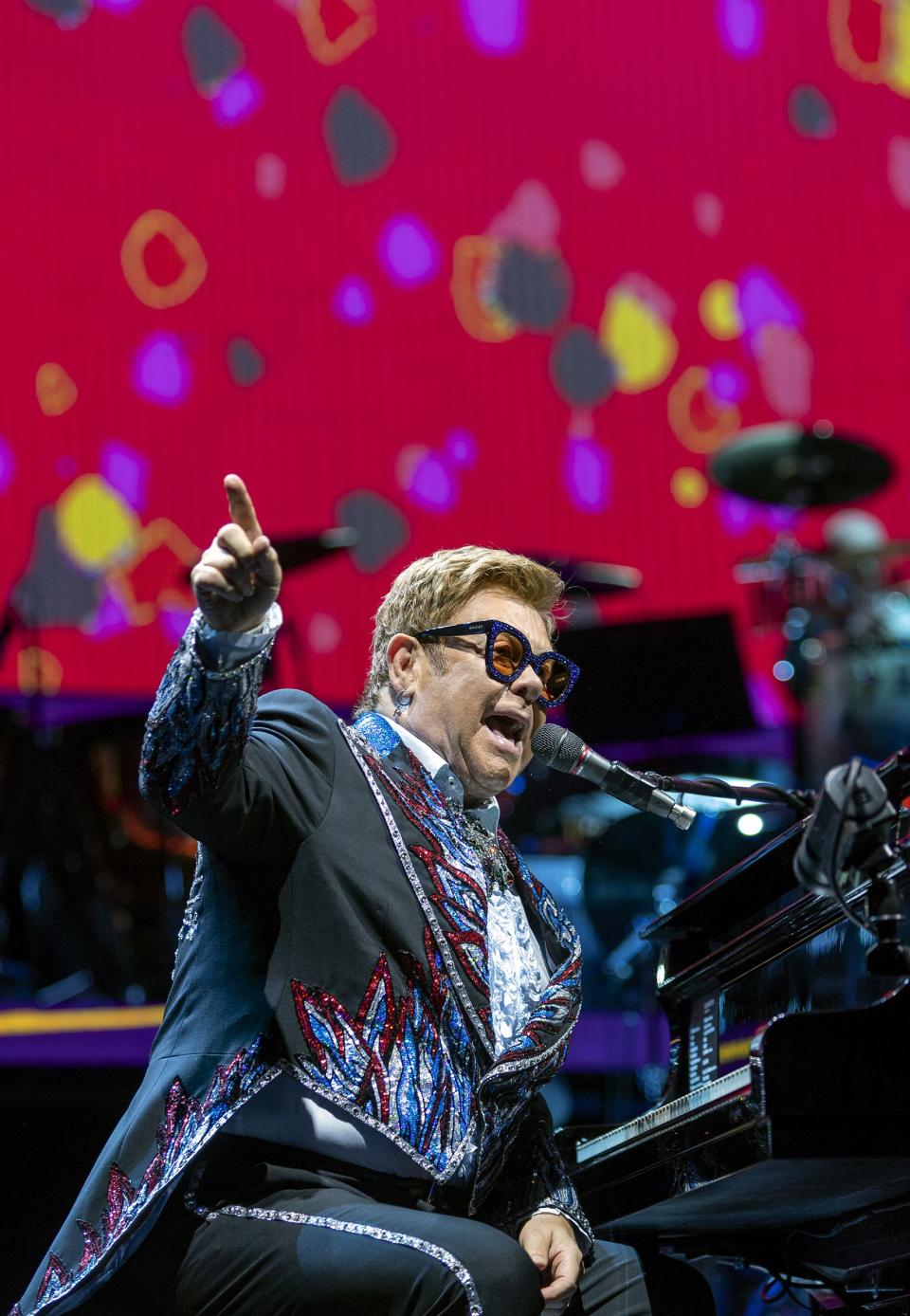 Elton John gestures out at the audience as he performs at Vivint Arena in Salt Lake City on Wednesday, Sept. 4, 2019. | Scott G Winterton, Deseret News