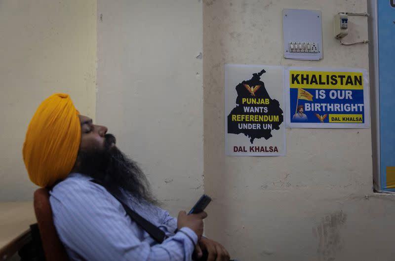 A member of the Dal Khalsa, a radical Sikh group, takes a nap inside their office in Amritsar