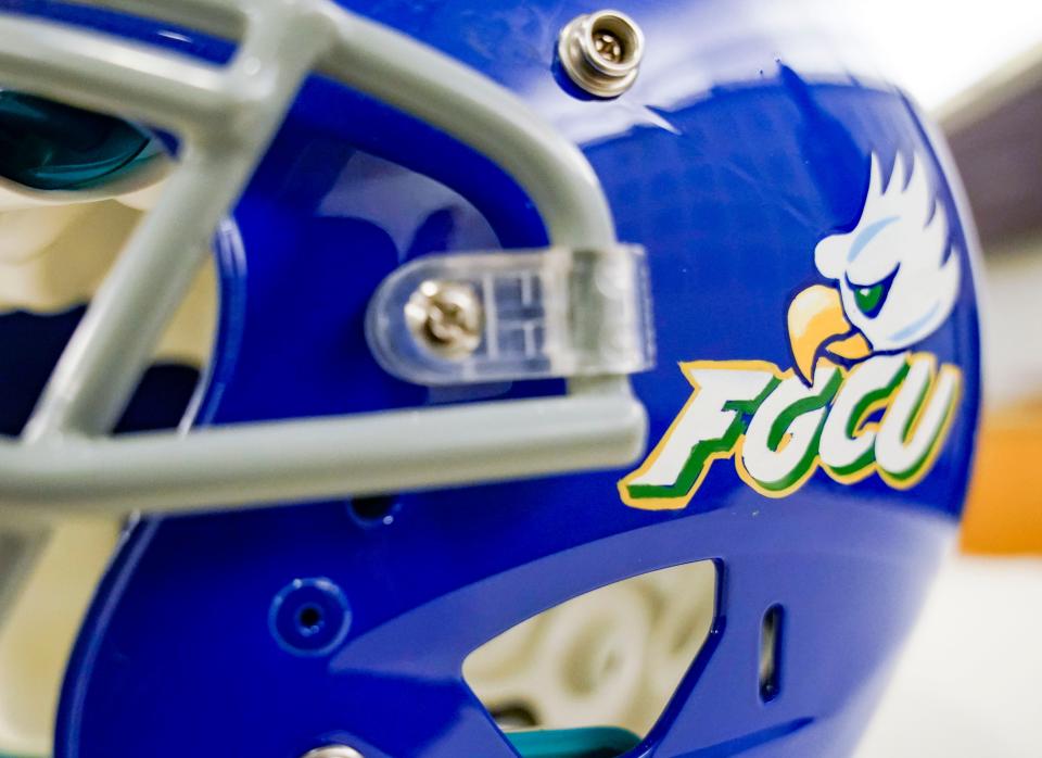 An FGCU football helmet is shown at Florida Gulf Coast University's library in Fort Myers on Wednesday, Feb. 22, 2023.