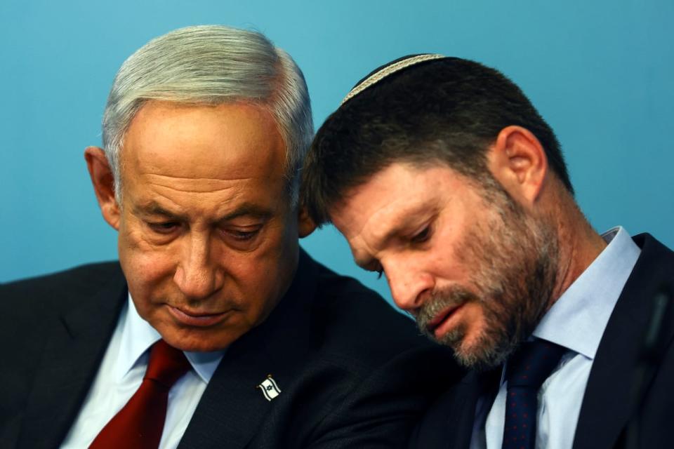 Israeli Prime Minister Benjamin Netanyahu and Israeli Finance Minister Bezalel Smotrich hold a news conference at the Prime Minister's office in Jerusalem, Wednesday, Jan. 25, 2023.