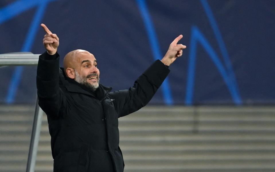 Pep Guardiola gestures frantically from the sidelines - PA