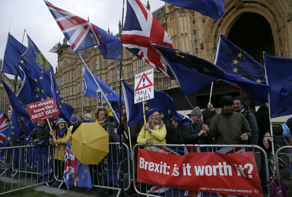 An anti-Brexit pro-remain supporters gather outside the House of Parliament in London, Tuesday, March 12, 2019. Prime Minister Theresa May's mission to secure Britain's orderly exit from the European Union appeared headed for defeat Tuesday, as lawmakers ignored her entreaties to support her divorce deal and end the political chaos and economic uncertainty that Brexit has unleashed.(AP Photo/Tim Ireland)