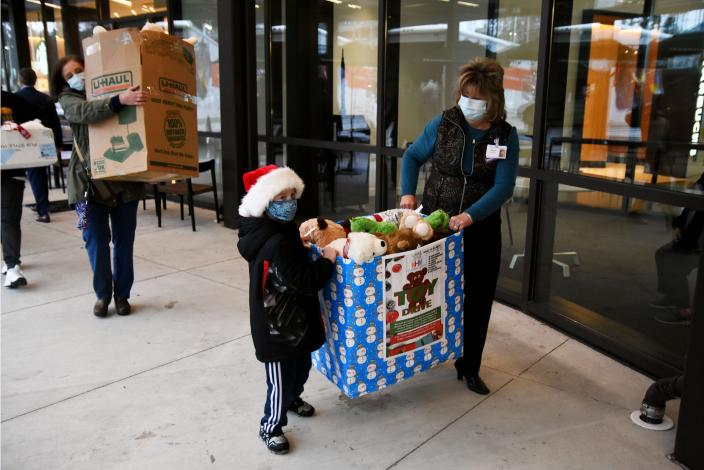Noah Darner, 6, left, is the reason why his brother, Zachary Darner, and their parents started collecting donated toys to give sick children in the hospital in 2016. After a hiatus during the pandemic, the program resumed this year.