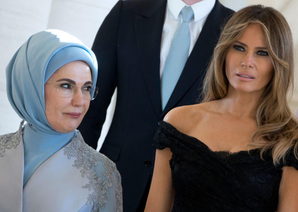 <p>Melania Trump, the wife of US President Donald Trump, right, and Emine Erdogan, the wife of Turkish President Recep Tayyip Erdogan pose together during a group photo during the spouse and partner program at the Royal Palace of Laeken, near Brussels, on Thursday, May 25, 2017. (Photo: Virginia Mayo/AP) </p>