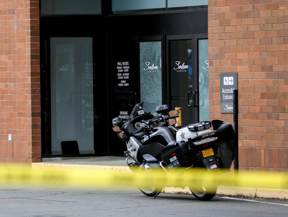 A shooting took place shattering glass on an entrance to Salem Center mall in March 2022.