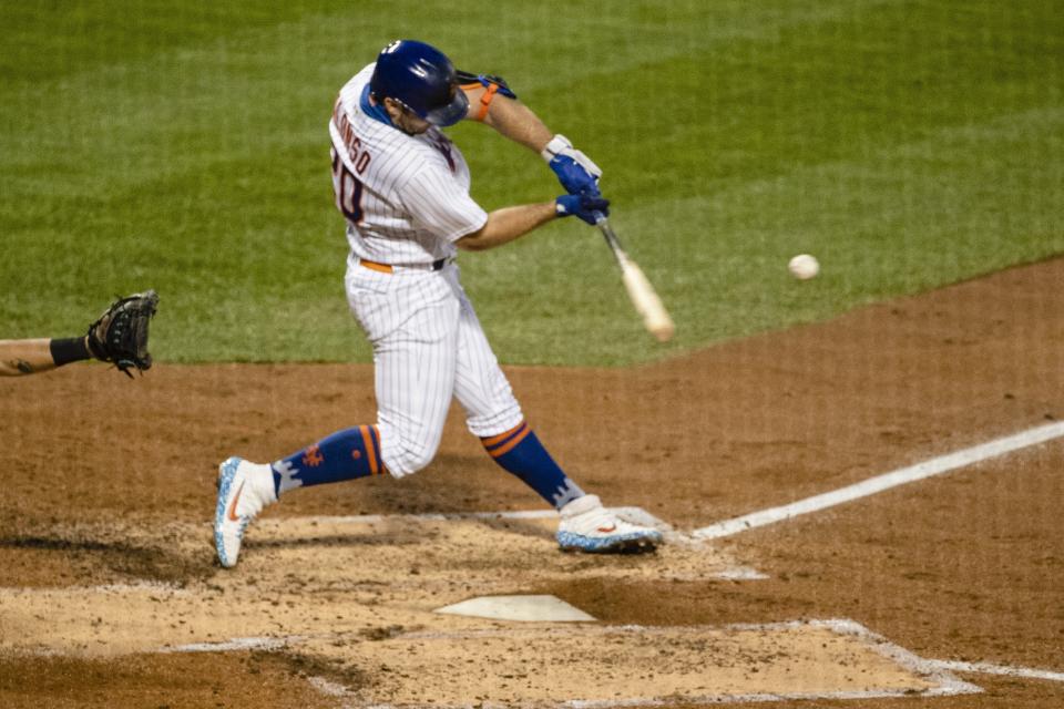 New York Mets' Pete Alonso hits a two-run home run during the third inning of a baseball game against the Miami Marlins Saturday, Aug. 8, 2020, in New York. (AP Photo/Frank Franklin II)