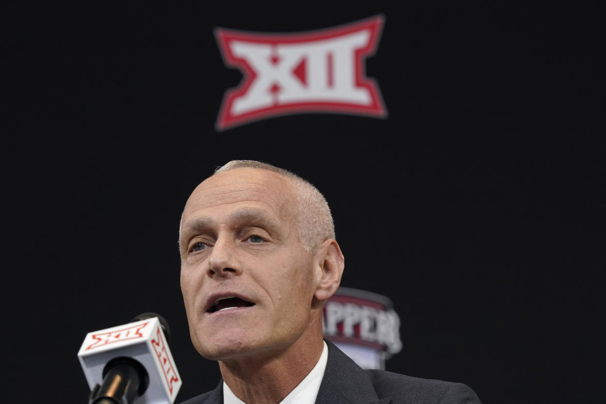 CORRECTS SPELLING OF LAST NAME TO YORMARK, NOT YORKMAN AS ORIGINALLY SENT - Incoming Big 12 Commissioner Brett Yormark speaks during a news conference opening the NCAA college football Big 12 media days in Arlington, Texas, Wednesday, July 13, 2022. (AP Photo/LM Otero)