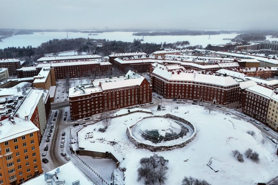 An aerial view taken on January 3, 2024 shows snow and ice in the TÃ¶Ã¶lÃ¶ area with the Temppeliaukio Church (front C) and Lapinlahti Bay in the Finnish capital Helsinki (AFP via Getty Images)