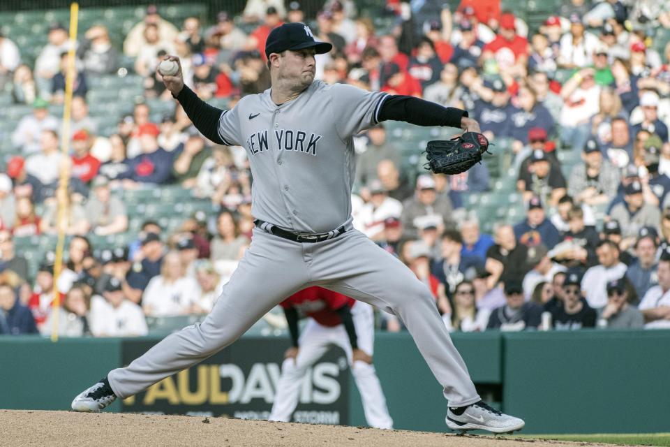 New York Yankees starting pitcher Gerrit Cole delivers against the Cleveland Guardians during the first inning of a baseball game in Cleveland, Tuesday April 11, 2023. (AP Photo/Phil Long)