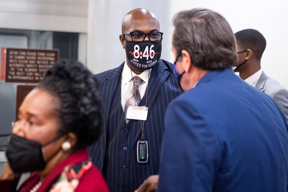 Philonise Floyd, center, the brother of George Floyd, talks with Rep. John Garamendi, D-Calif., while visiting Capitol Hill to discuss the George Floyd Justice in Policing Act, in Washington, D.C., on April 29, 2021.<span class="copyright">Tom Williams—CQ-Roll Call, Inc./Getty Images</span>