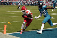 Kansas City Chiefs wide receiver Skyy Moore (24) makes a catch for a touchdown in front of Jacksonville Jaguars cornerback Tyson Campbell (32) during the first half of an NFL football game, Sunday, Sept. 17, 2023, in Jacksonville, Fla. (AP Photo/John Raoux)