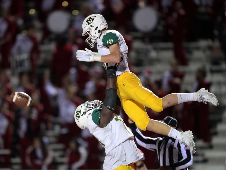 Medina wide receiver Jack Wojciak, who also scored on a 95-yard kickoff return, celebrates with offensive lineman Pete Jarvis after catching the game-winning touchdown in a victory over Wadsworth on Friday.