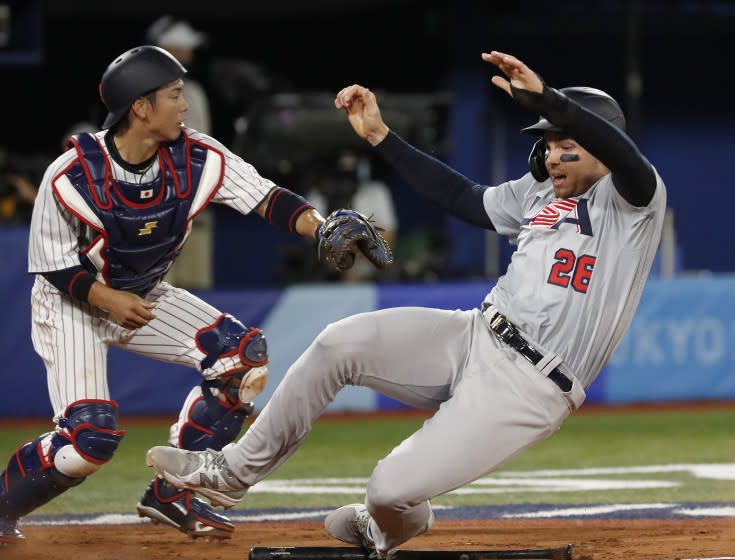 TOKYO, - AUGUST 02: Triston Casas from Team USA slides into home plate.