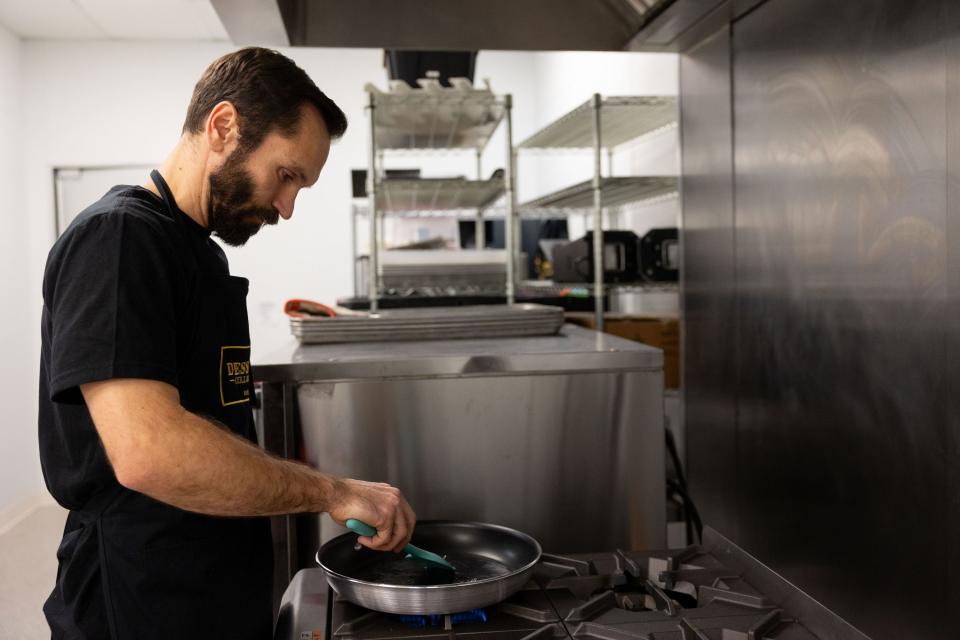 Marc Favreau works on one of the flavors for Eleanor’s Coconut Cream in the kitchen at The Dessert Collective in American Fork on Tuesday, Jan. 2, 2024. Favreau co-owns the company with Rachel Knight and Misty Shawcroft. | Megan Nielsen, Deseret News