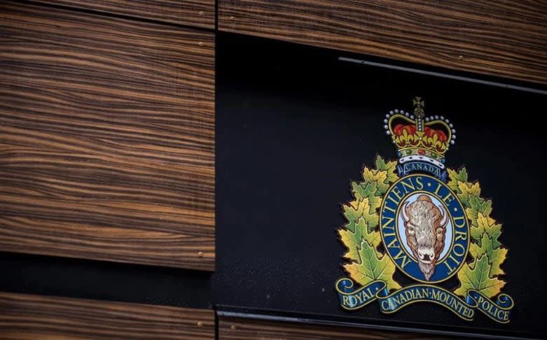 The RCMP logo is seen outside Royal Canadian Mounted Police "E" Division Headquarters, in Surrey, B.C.