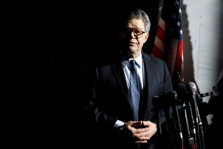 FILE PHOTO: U.S. Senator Al Franken addresses the media outside his office on Capitol Hill in Washington, U.S., November 27, 2017. REUTERS/Yuri Gripas/File Photo