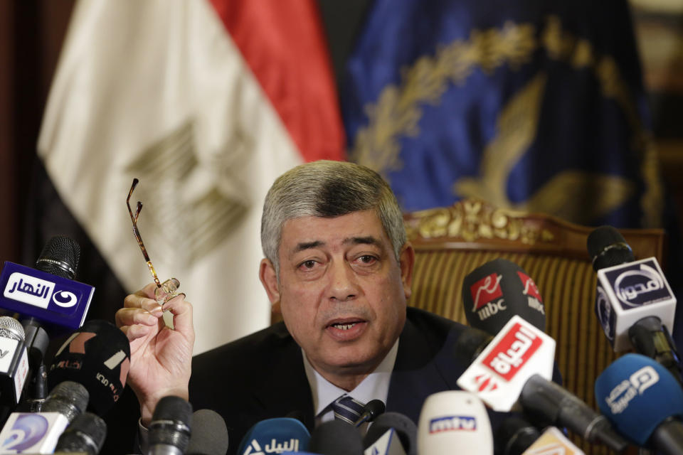 Egypt's Interior Minister Mohammed Ibrahim speaks during a press conference in Cairo, Egypt, Sunday, March 30, 2014. Ibrahim said his agents seized the documents, smuggled out of the presidential palace, before they were leaked to Qatar-based Al-Jazeera network, and the intelligence agency of an Arab country allied with the Muslim Brotherhood. (AP Photo/Hassan Ammar)