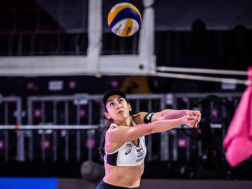 Melissa Humana-Paredes, pictured, and Canadian beach volleyball teammate Sarah Pavan dominated reigning Olympic champions April Ross and Alix Klineman for a straight-sets semifinal win at the FIVB World Tour Finals on Saturday in Sardinia. (Submitted by Volleyball World - image credit)