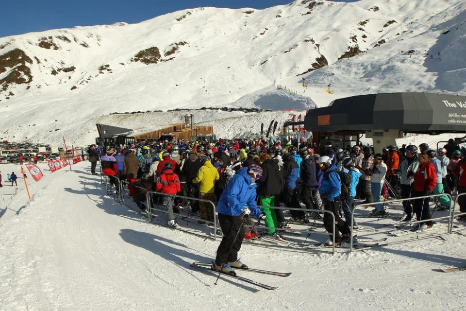 People prepare to ski at Treble Cone ski resort in Wanaka, New Zealand.