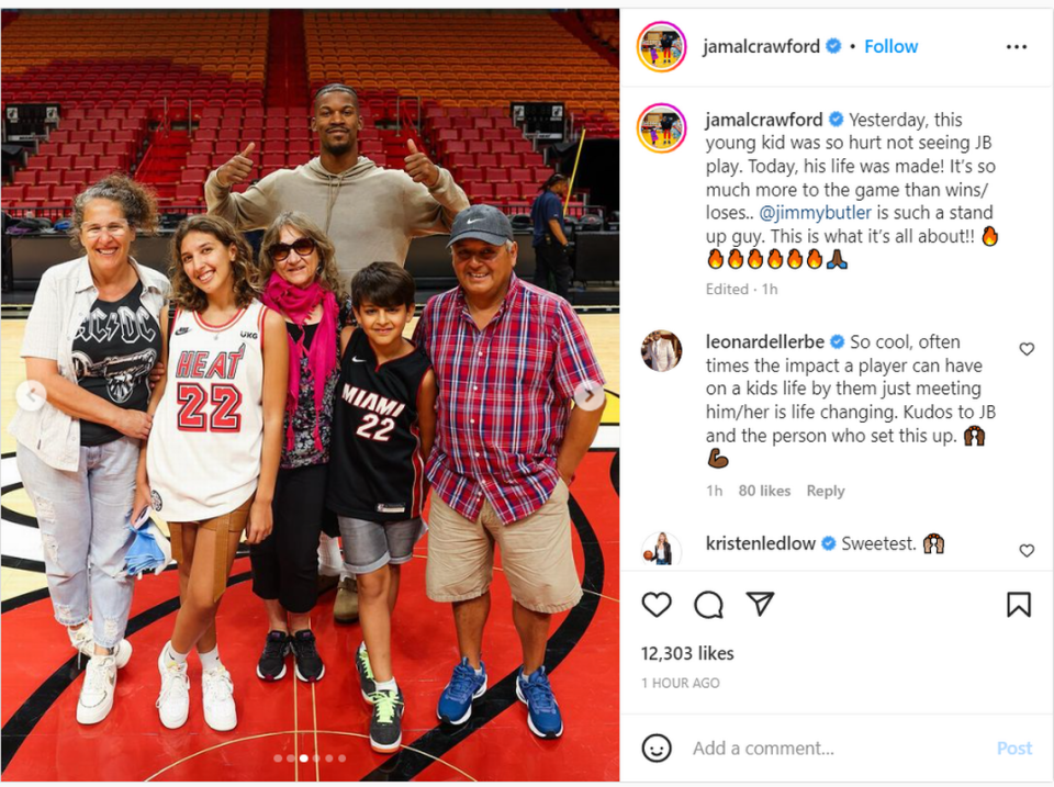 Heat star Jimmy Butler takes photos with 12-year-old Felipe, a fan from Argentina that traveled 4.405 miles to see him play. Butler did not play Tuesday, so he made it up the young fan and his family on Wednesday, Jan. 25, 2023 at FTX Arena. Screenshot Instagram @JamalCrawford